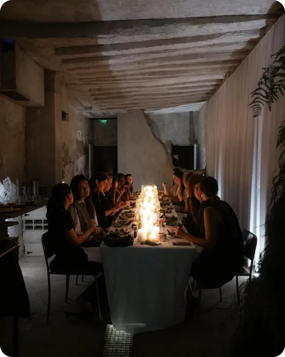 A private chef plating a refined dish in the kitchen